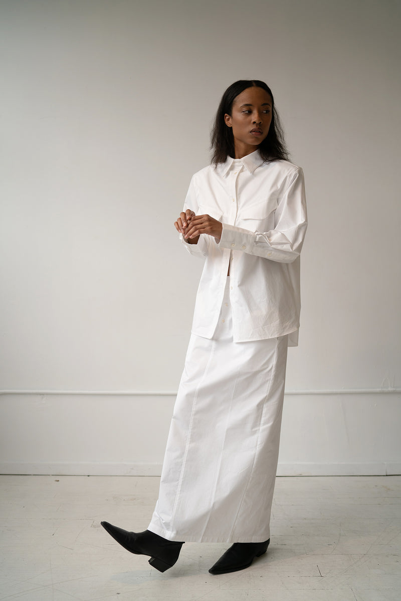 HCTR Long Poplin Boxer Skirt in Optic White front view model wearing white oversized poplin button-down