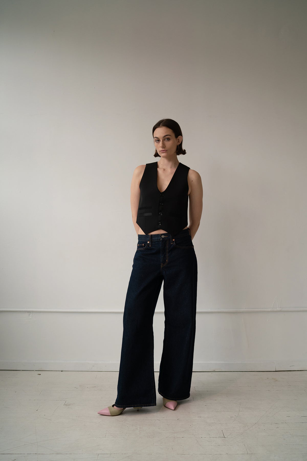 HCTR Modular 100% Wool Waistcoat in Onyx — full body shot showing full styling option with pointed kitten heel