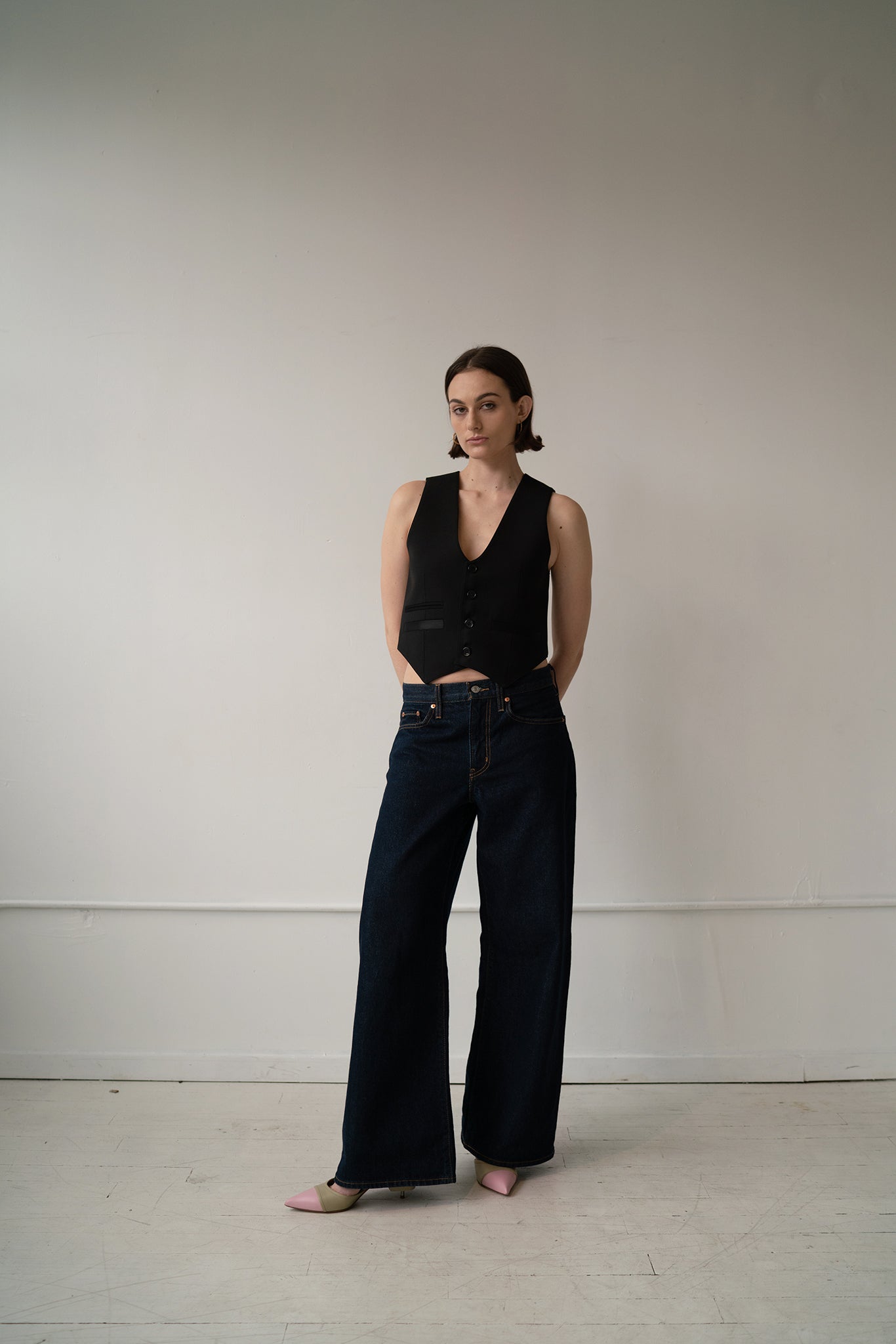 HCTR Modular 100% Wool Waistcoat in Onyx — full body shot showing full styling option with pointed kitten heel